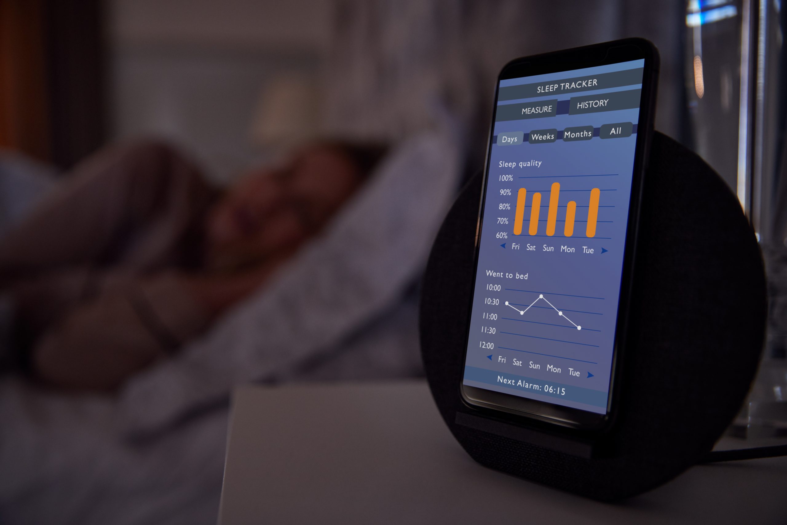 Woman,Sleeping,In,Bed,With,Sleep,Data,App,Running,On